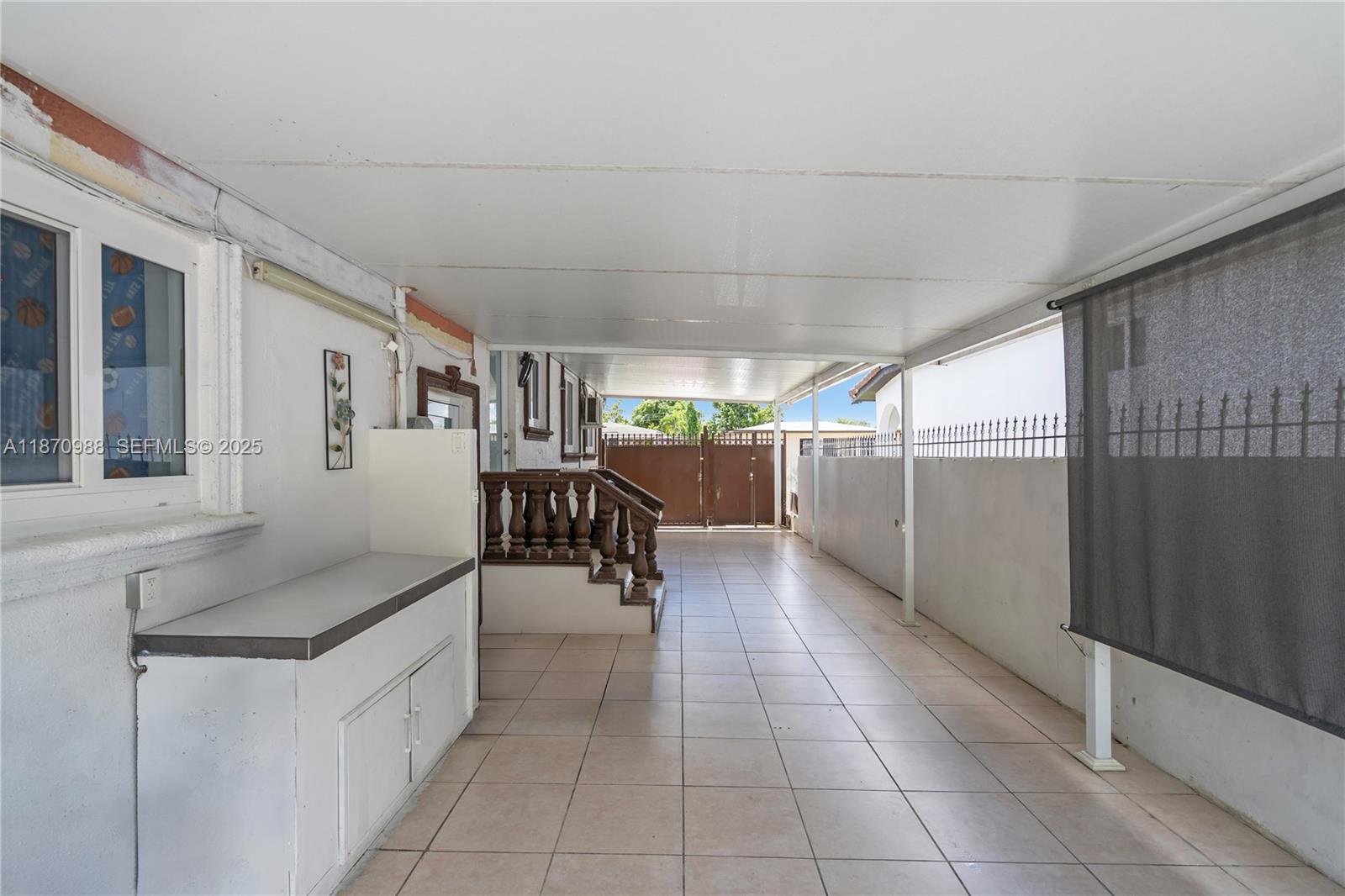 171 West 64th Street Hialeah, FL 33012 - Photo 13 of 22 a lobby with furniture and window