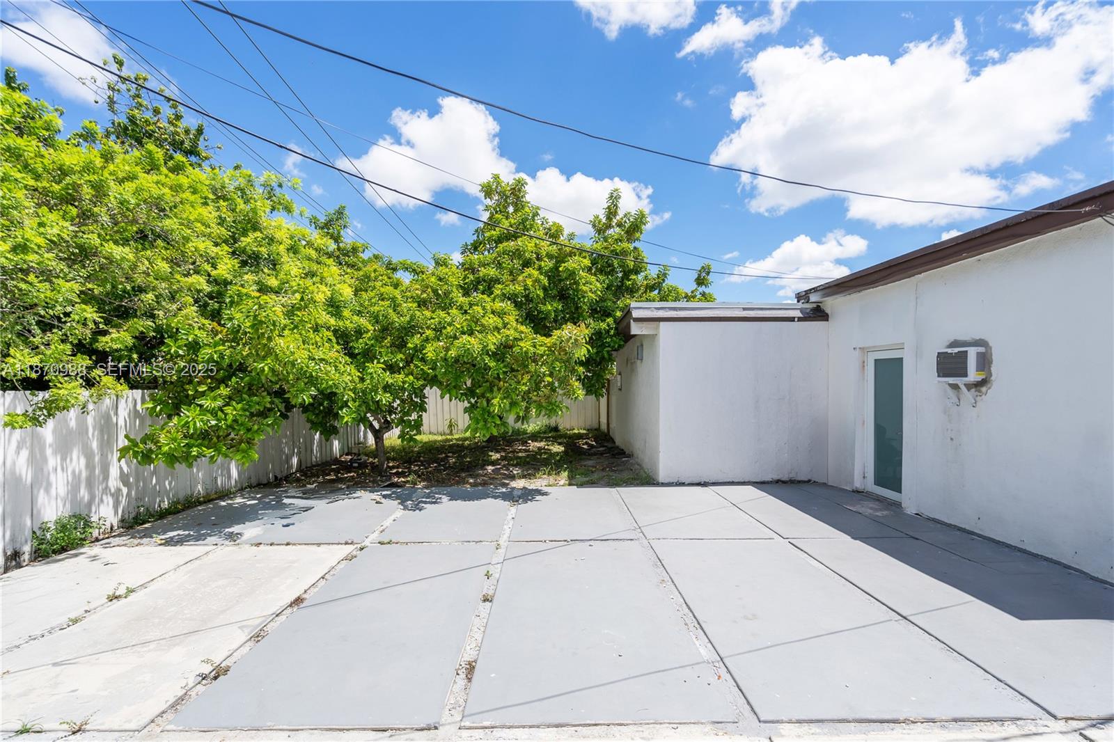 171 West 64th Street Hialeah, FL 33012 - Photo 16 of 22 a view of a garage
