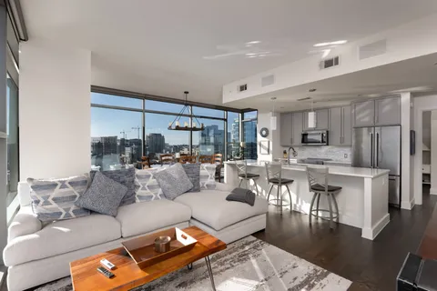 a room with furniture and a window