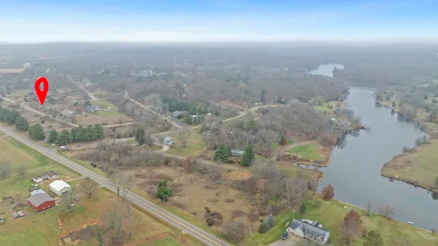 a view of a yard with trees