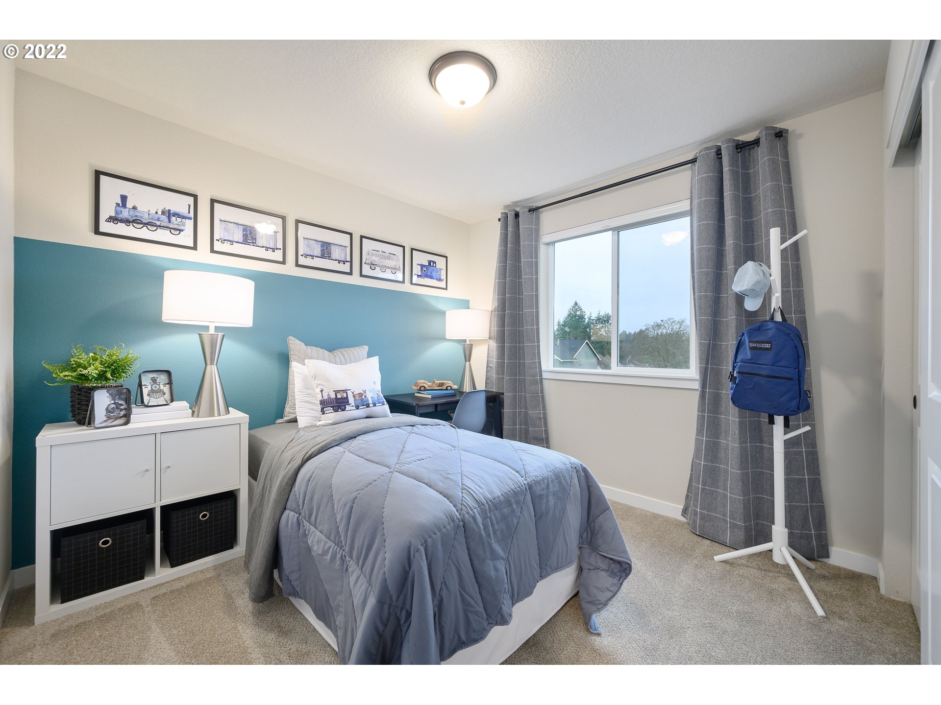 8521 North 5th Street, Unit LT 3 Ridgefield, WA 98642 - Photo 19 of 32 a bedroom with a bed and a window