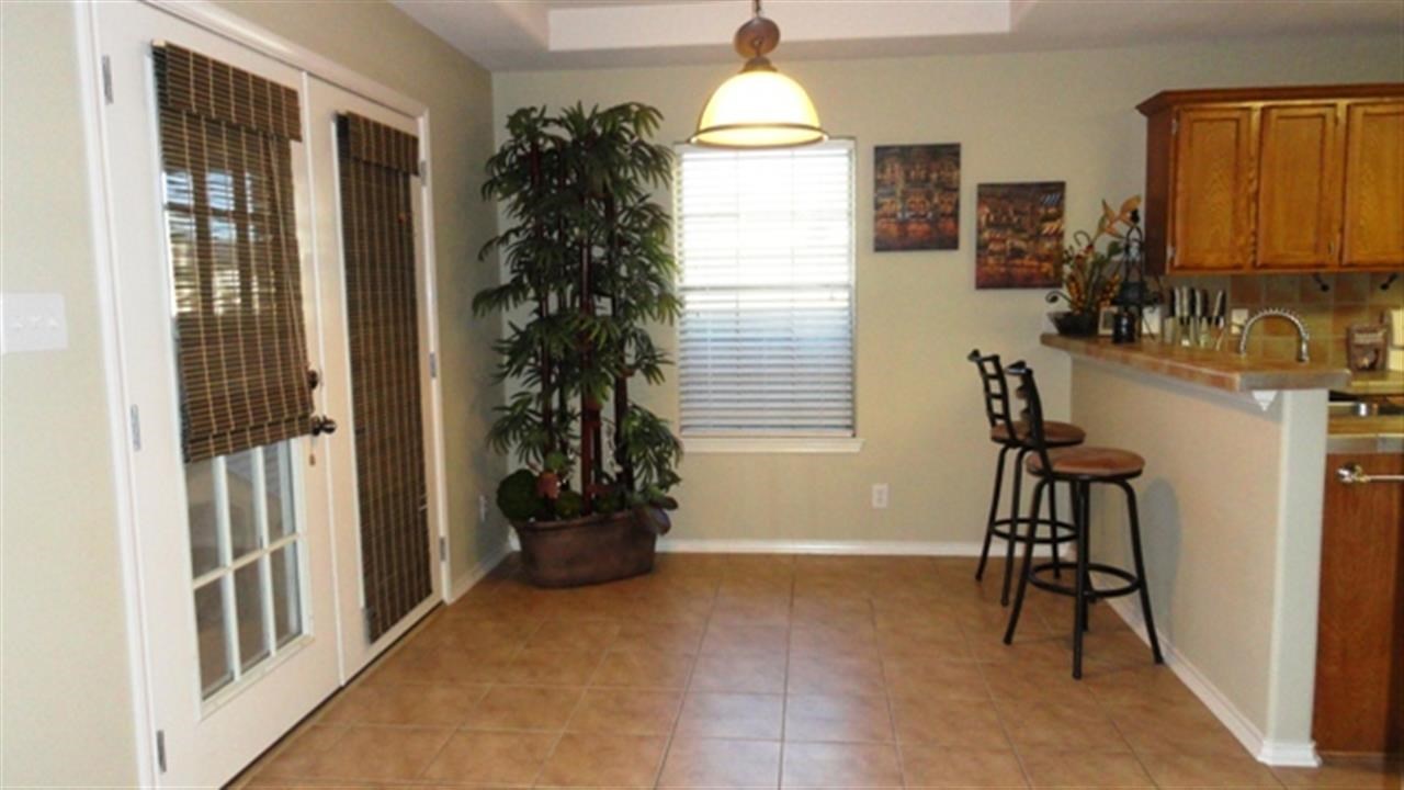 102 Sun Ray Loop Laredo, TX 78041 - Photo 4 of 9 a view of hallway with livingroom and furniture