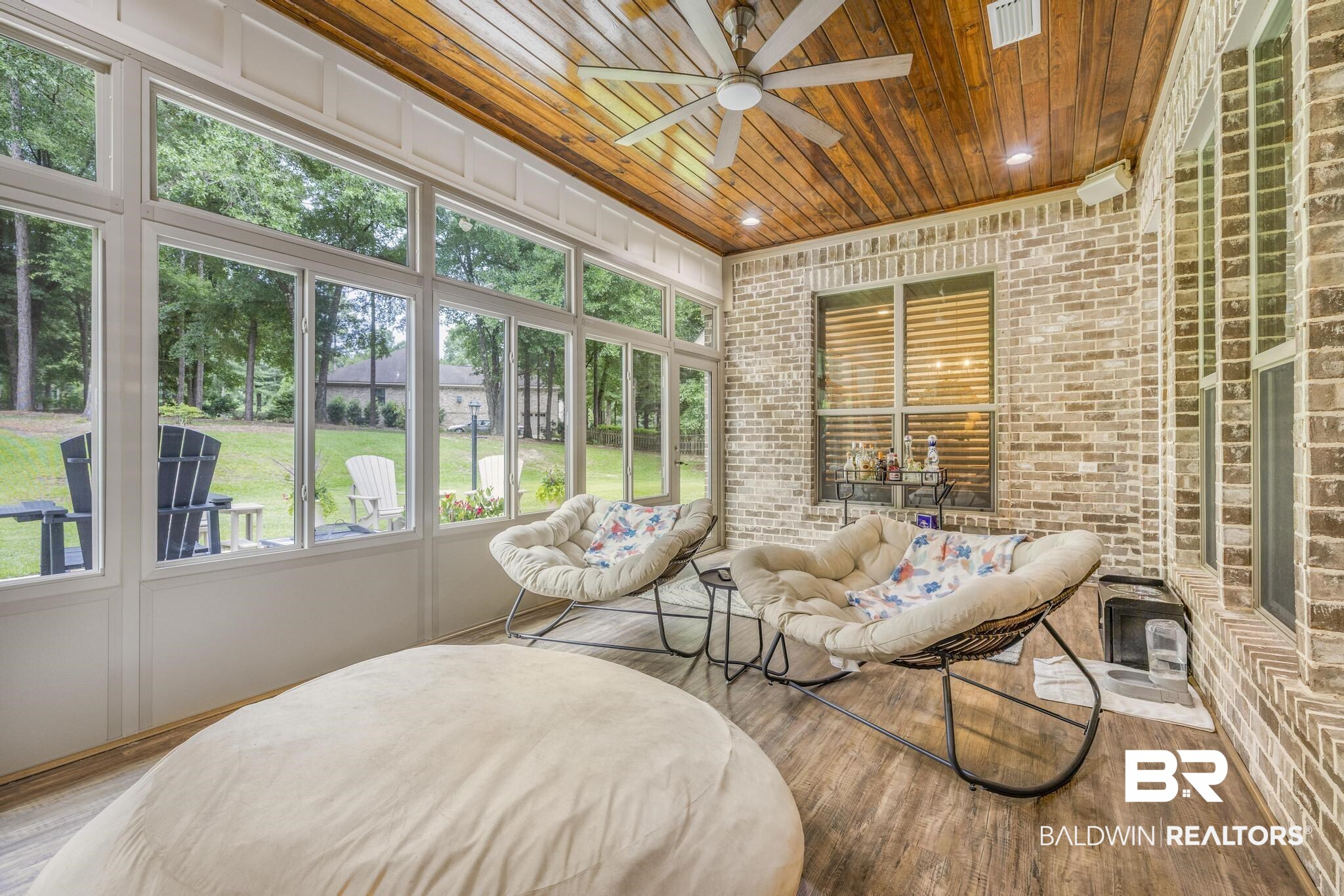 29949 Dolive Ridge Daphne, AL 36527 - Photo 45 of 55 Enclosed patio featuring floor-to-ceiling windows, wood-finish flooring, and a wood plank ceiling