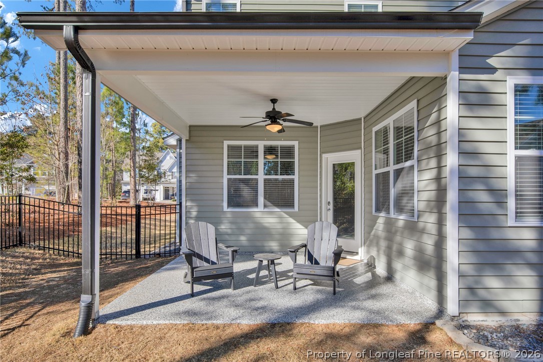 224 Timber Skip Drive Spring Lake, NC 28390 - Photo 29 of 30 a front view of a house with outdoor seating