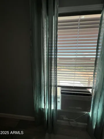 a view of a room that has a window