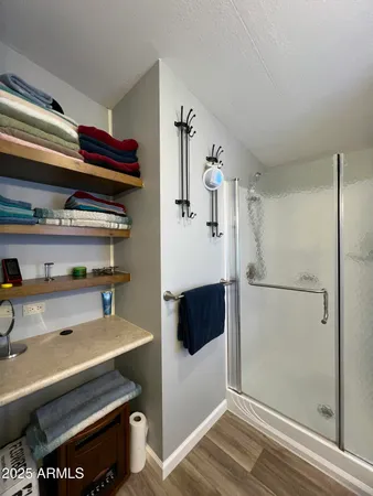 a bathroom with a bathtub and a shower