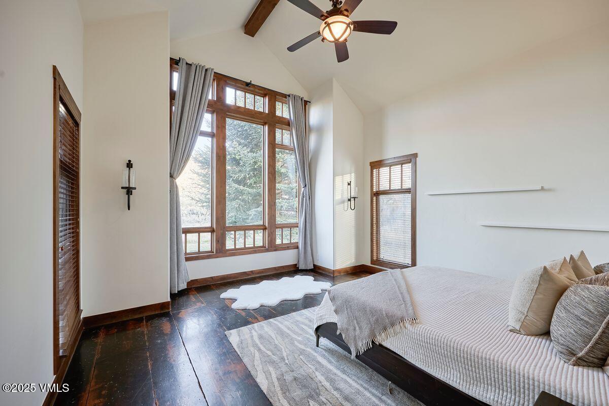 748 Hernage Creek Road Eagle, CO 81631 - Photo 14 of 44 a bed sitting in a bedroom next to a window