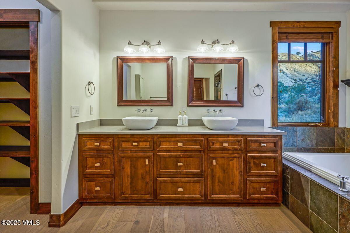 748 Hernage Creek Road Eagle, CO 81631 - Photo 16 of 44 a bathroom with a sink and a mirror