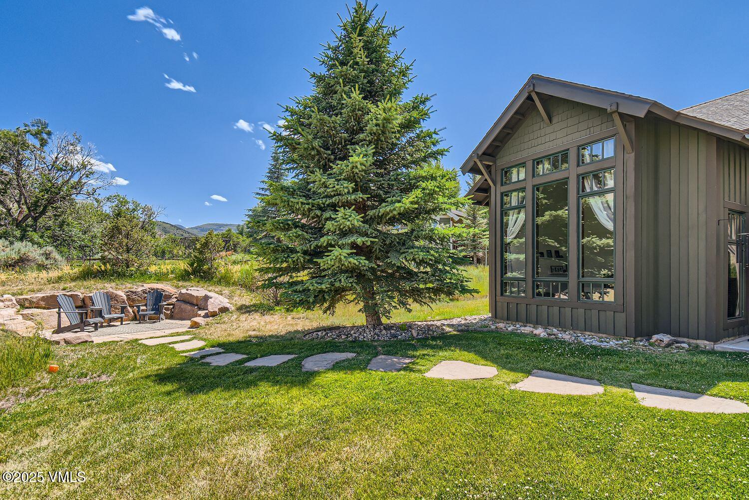 748 Hernage Creek Road Eagle, CO 81631 - Photo 38 of 44 a front view of a house with garden