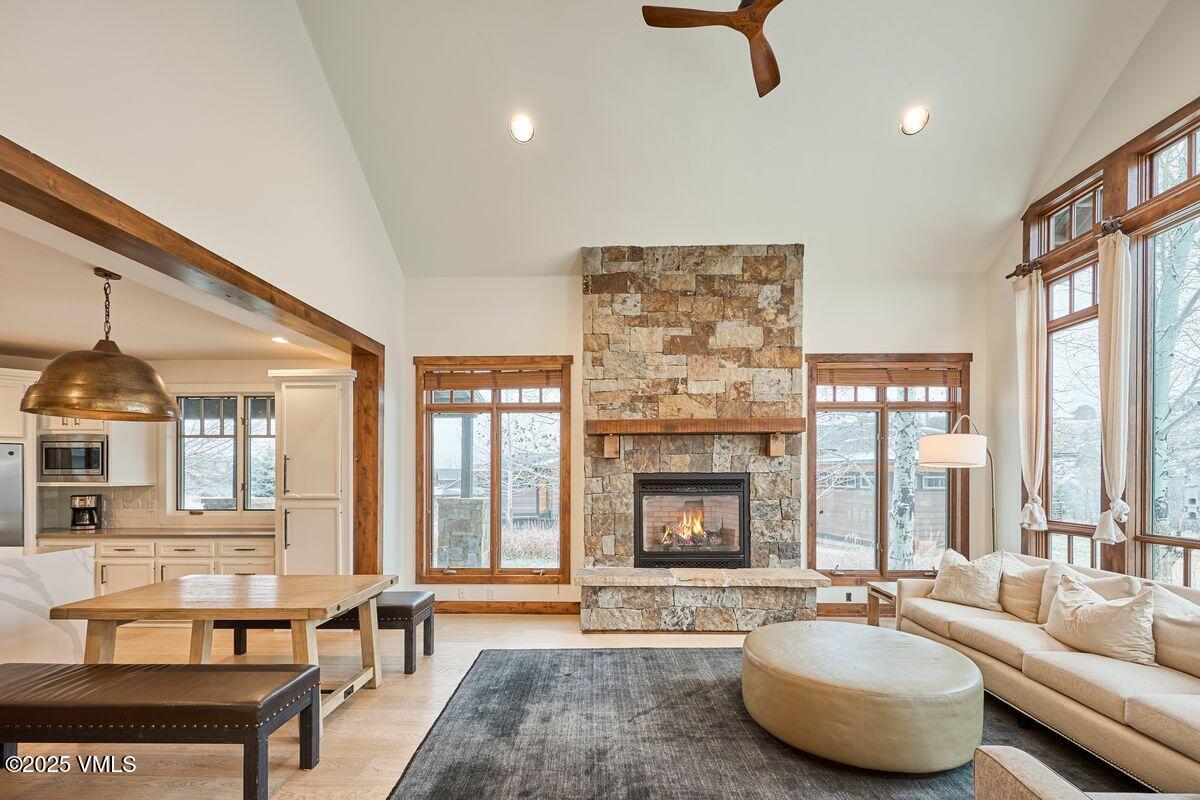 748 Hernage Creek Road Eagle, CO 81631 - Photo 4 of 44 a living room with furniture and a fireplace