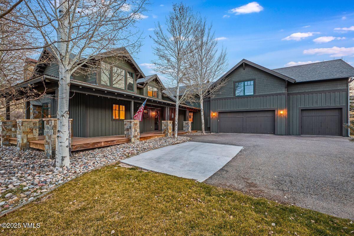 748 Hernage Creek Road Eagle, CO 81631 - Photo 42 of 44 a front view of a house with a yard and garage