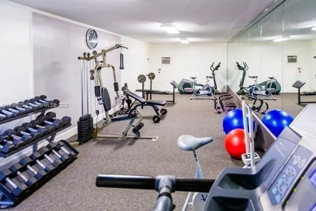 a view of a room with gym equipment