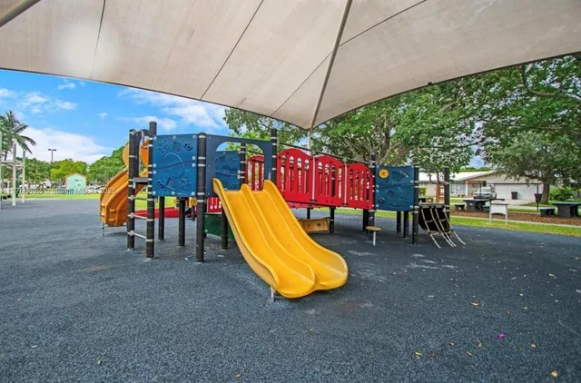 a view of a park with slide