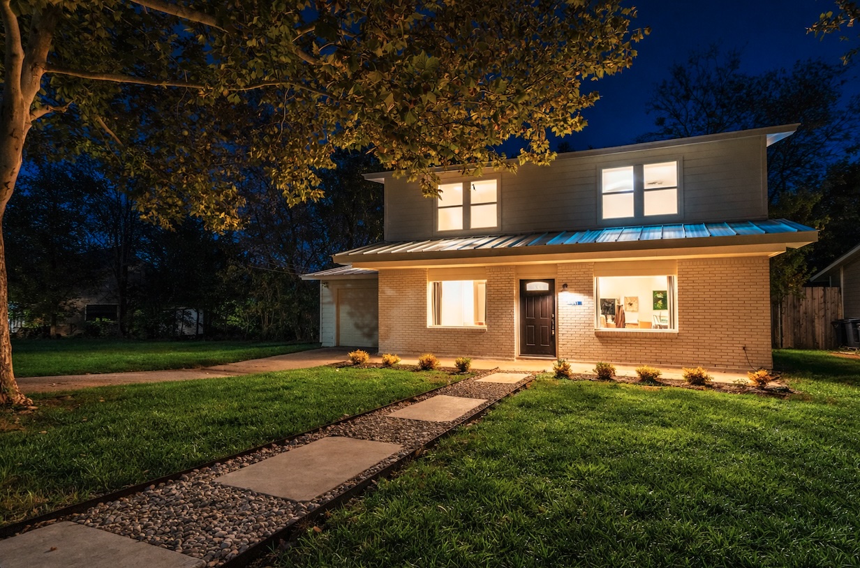 3801 Wilson Street Austin, TX 78704 - Photo 2 of 36 a front view of a house with a yard
