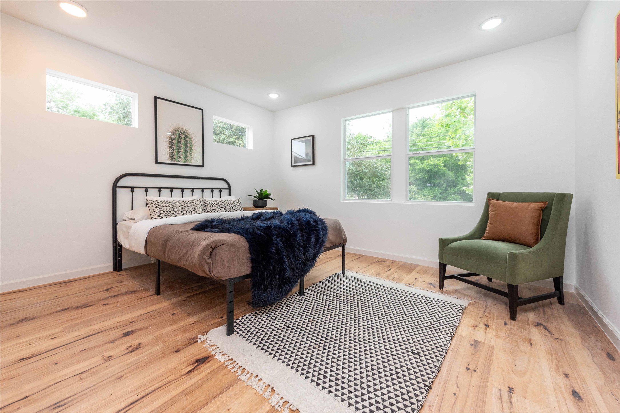 3801 Wilson Street Austin, TX 78704 - Photo 29 of 36 a bedroom with a bed a couch and a window