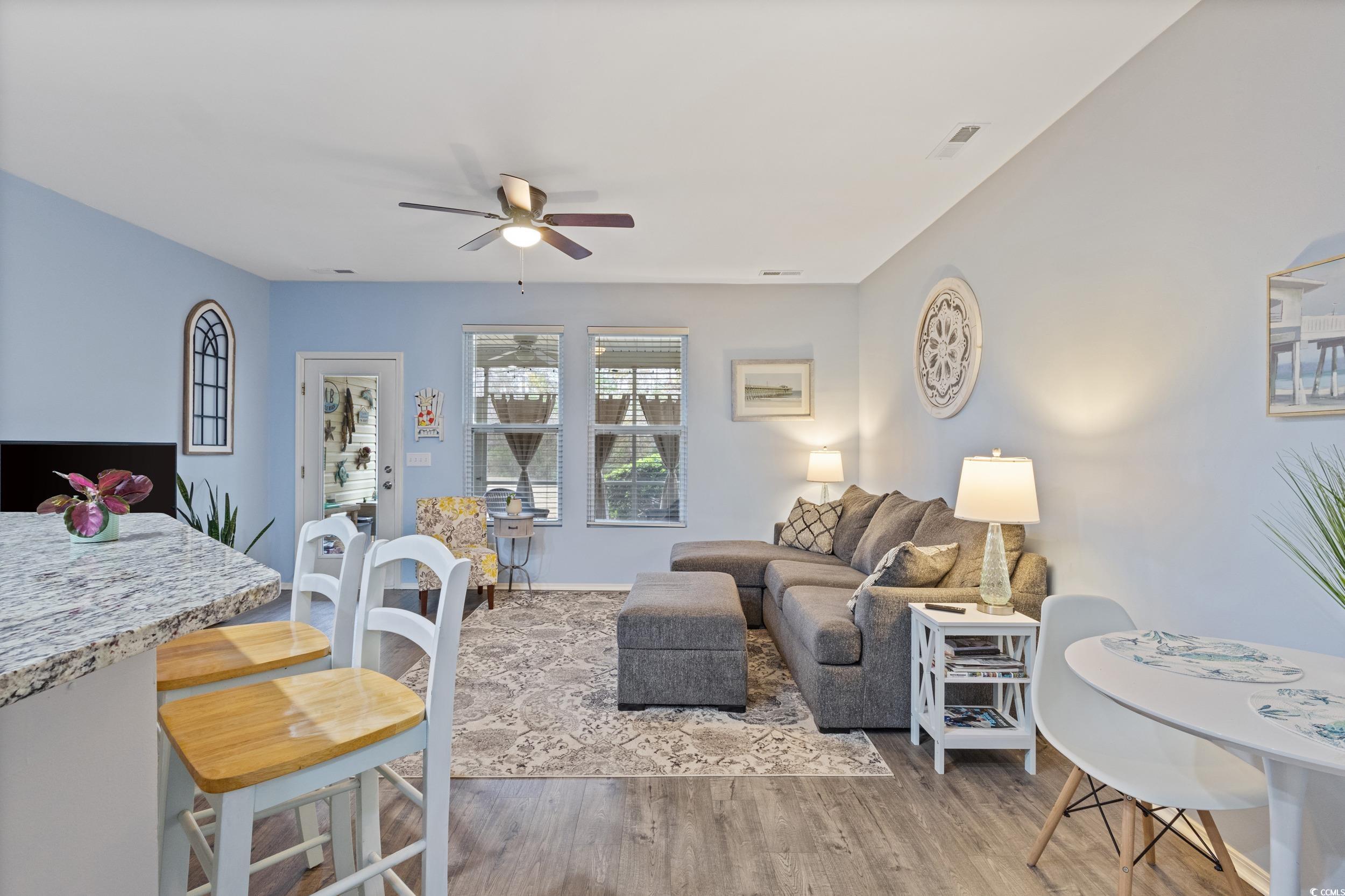 140 Olde Towne Way, Unit 2 Myrtle Beach, SC 29588 - Photo 15 of 40 Living room featuring light wood finished floors and a ceiling fan