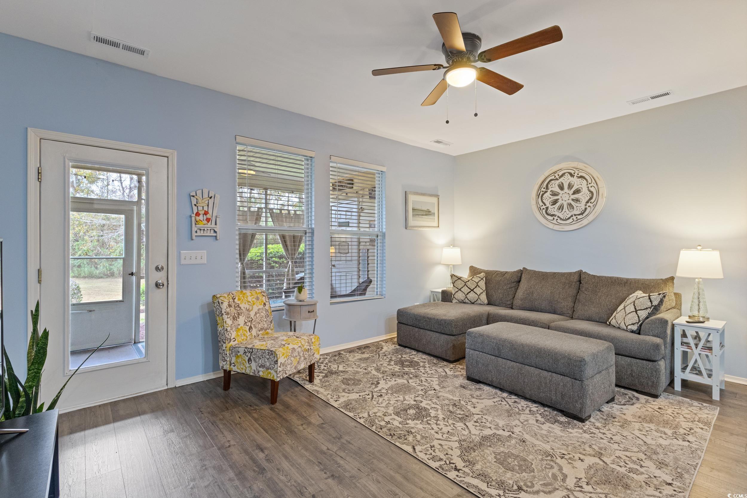 140 Olde Towne Way, Unit 2 Myrtle Beach, SC 29588 - Photo 18 of 40 Living room with wood finished floors and ceiling fan