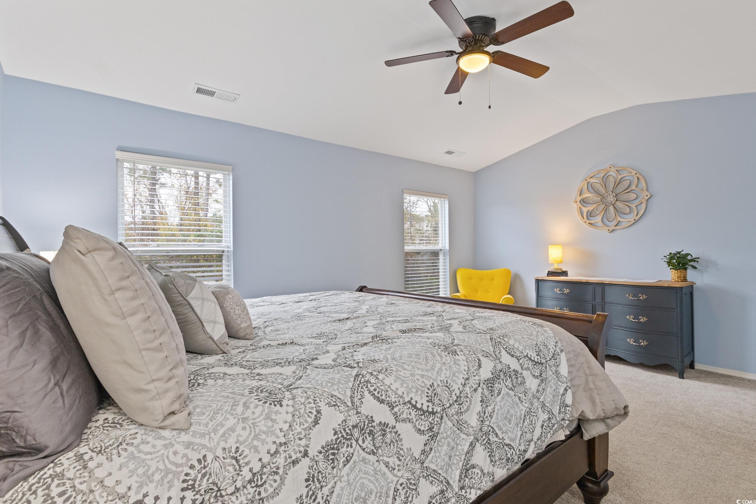 140 Olde Towne Way, Unit 2 Myrtle Beach, SC 29588 - Photo 27 of 40 Bedroom with light carpet, ceiling fan, and lofted ceiling