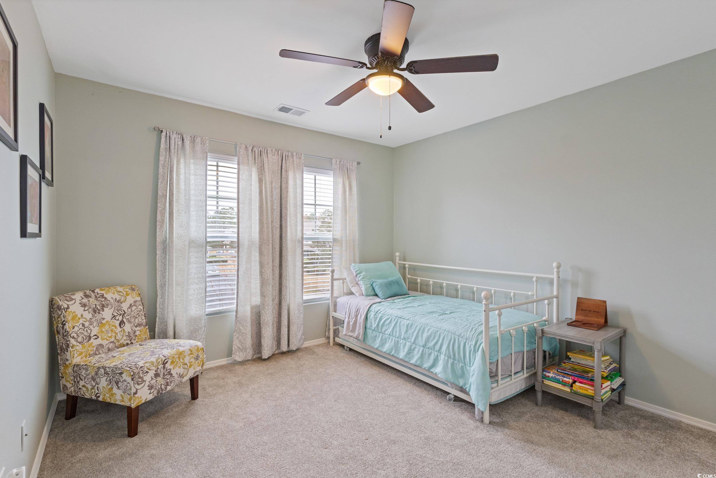 140 Olde Towne Way, Unit 2 Myrtle Beach, SC 29588 - Photo 31 of 40 Bedroom with light carpet and ceiling fan
