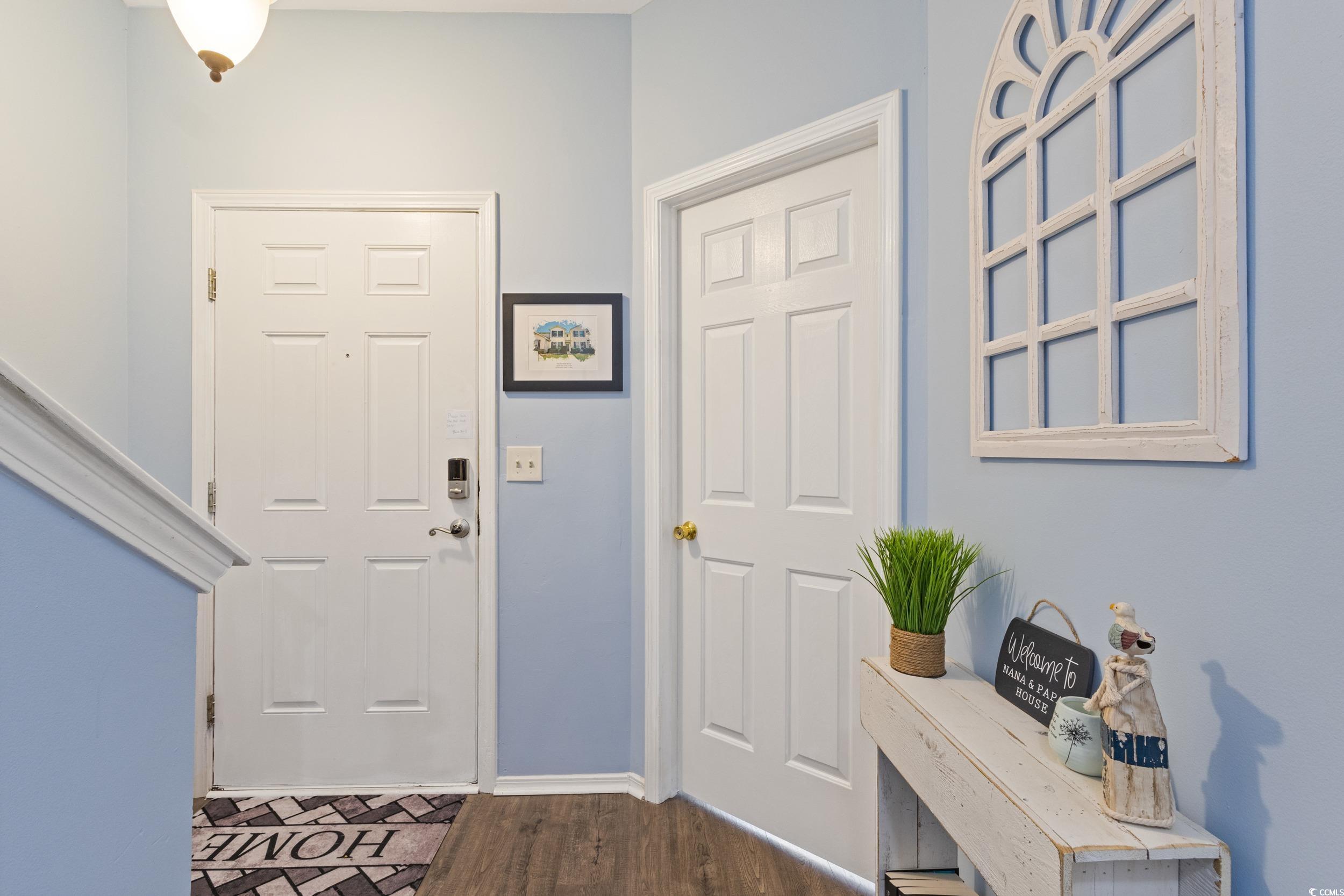 140 Olde Towne Way, Unit 2 Myrtle Beach, SC 29588 - Photo 5 of 40 Entrance foyer featuring dark wood-type flooring and baseboards