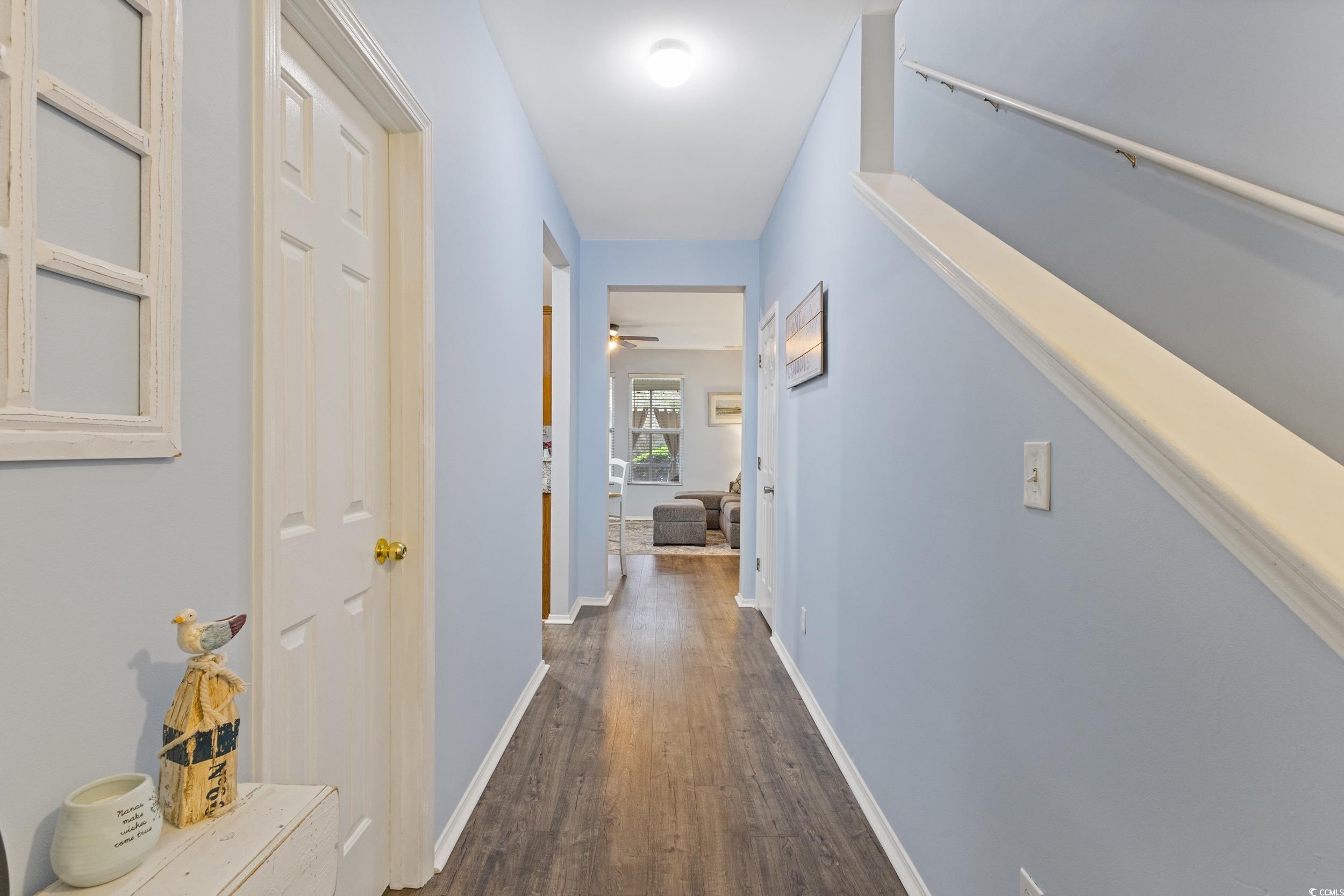 140 Olde Towne Way, Unit 2 Myrtle Beach, SC 29588 - Photo 6 of 40 Hall with dark wood-style floors and baseboards