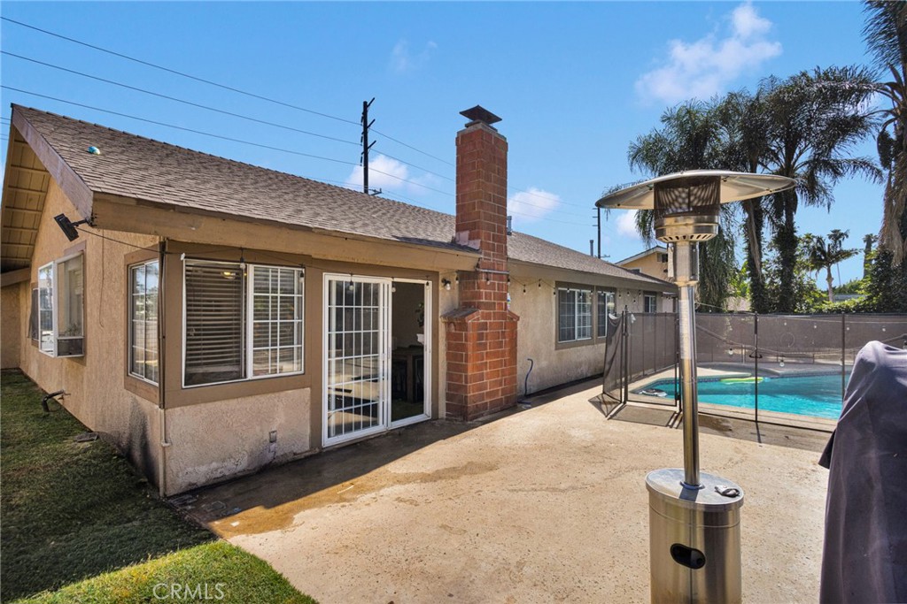 1087 Baseline Road La Verne, CA 91750 - Photo 31 of 39 a front view of a house with parking space