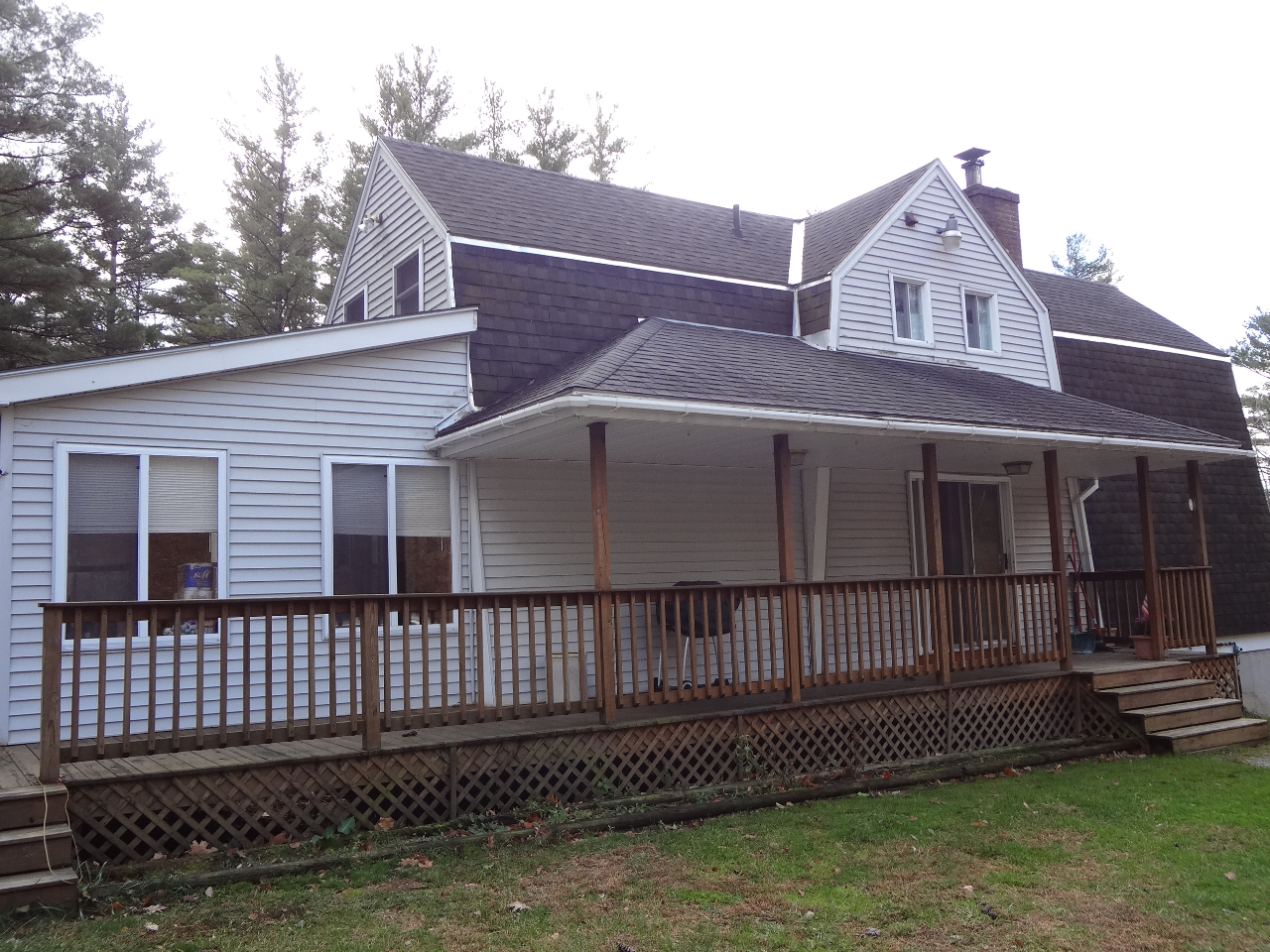 76 Pine Hollow Road Pownal, VT 05261 - Photo 2 of 17 a front view of a house with a yard