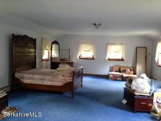 76 Pine Hollow Road Pownal, VT 05261 - Photo 15 of 17 a bedroom with furniture and window