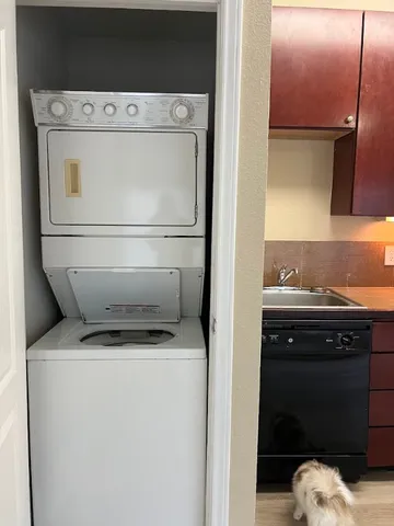 a bathroom with a double vanity sink and mirror