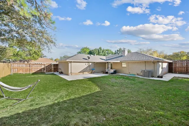 a house view with a garden space