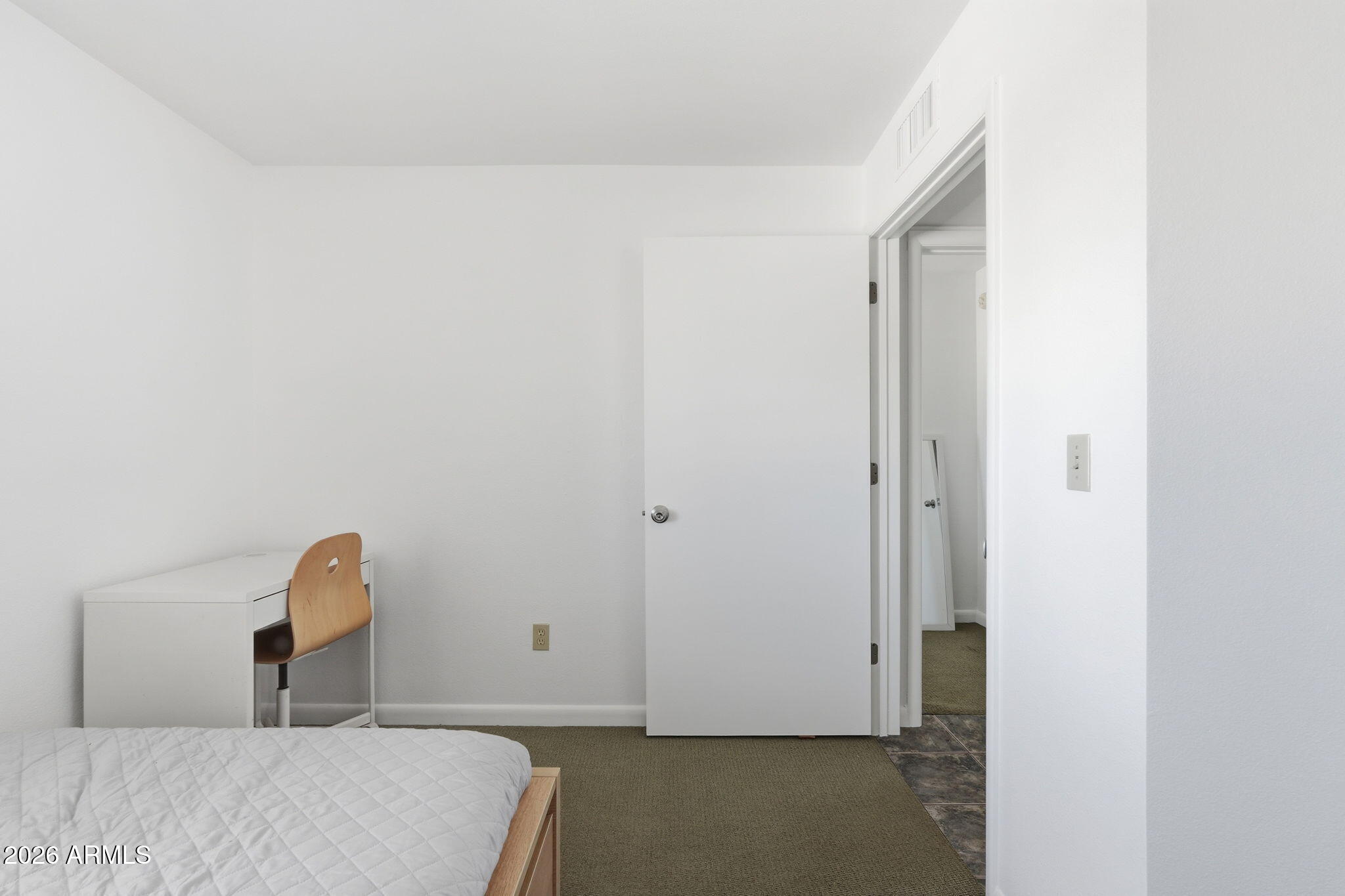 1005 East 8th Street, Unit 2003 Tempe, AZ 85281 - Photo 20 of 38 a room with a bed and a window