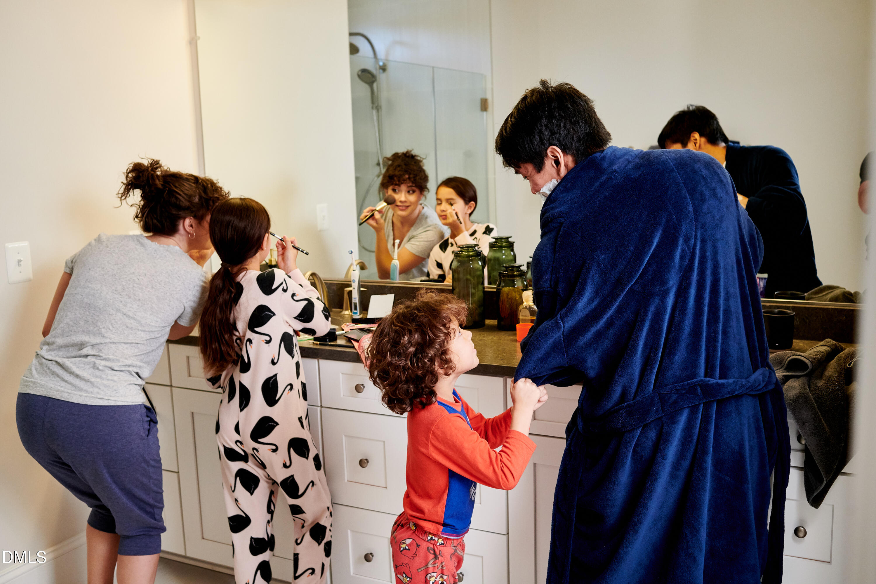 605 Hedrick Ridge Road, Unit 307 Cary, NC 27519 - Photo 35 of 44 Lifestyle - Family in Bathroom_Stanley M
