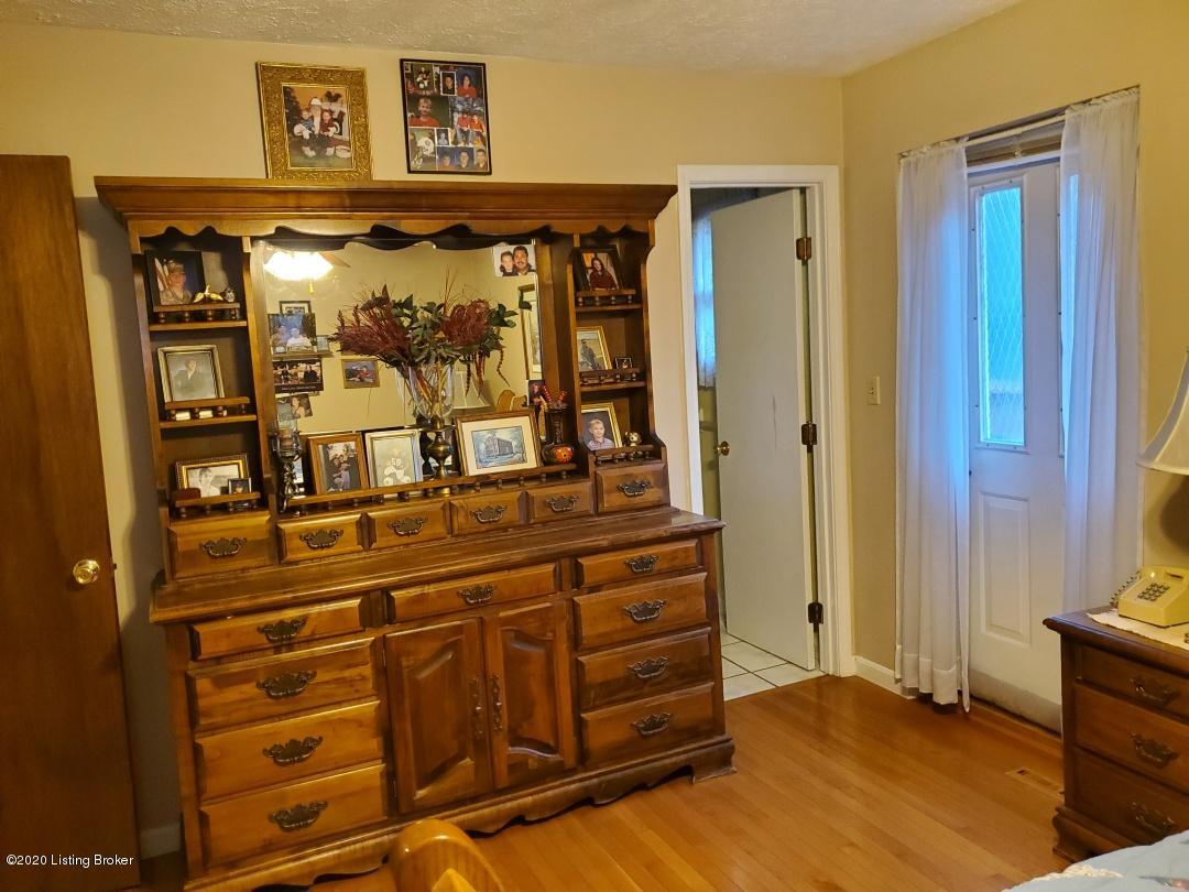 2616 Northern Road Radcliff, KY 40160 - Photo 12 of 44 Primary bedroom with half bath & door to