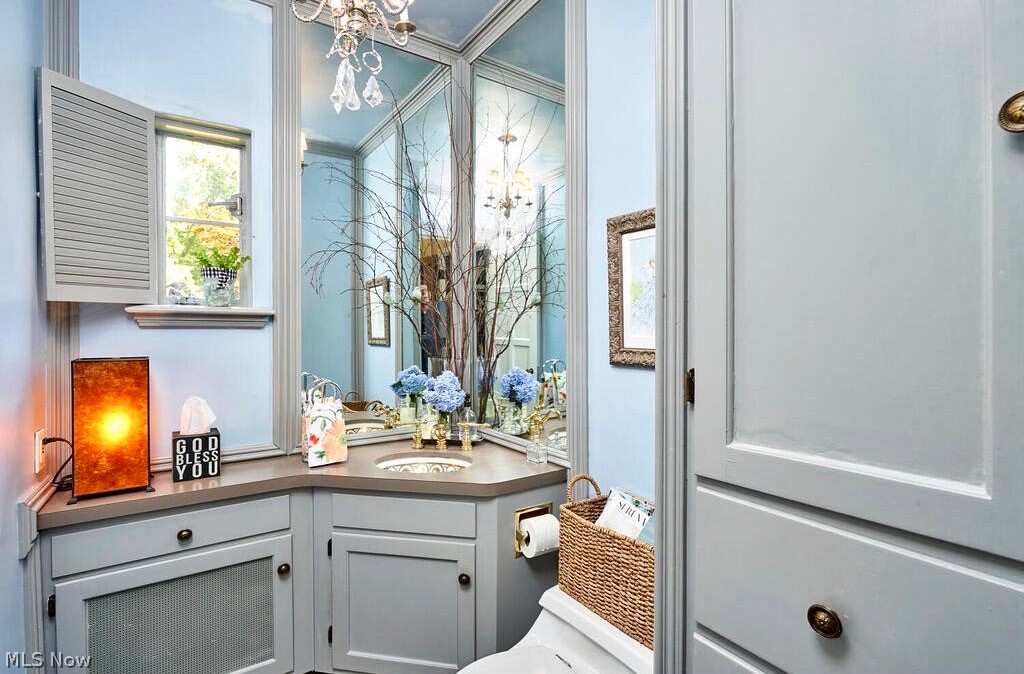 1954 Stockbridge Road Akron, OH 44313 - Photo 18 of 35 Enchanting Powder Room with built ins and corner sink.