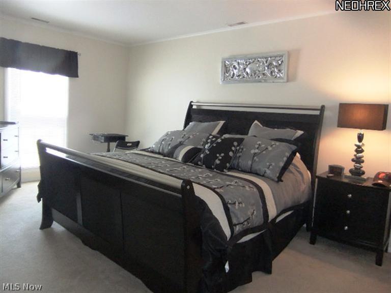 7370 Fox Mill Road, Unit B Mentor, OH 44060 - Photo 5 of 11 Spacious master bedroom has plenty of room for a king size bed.