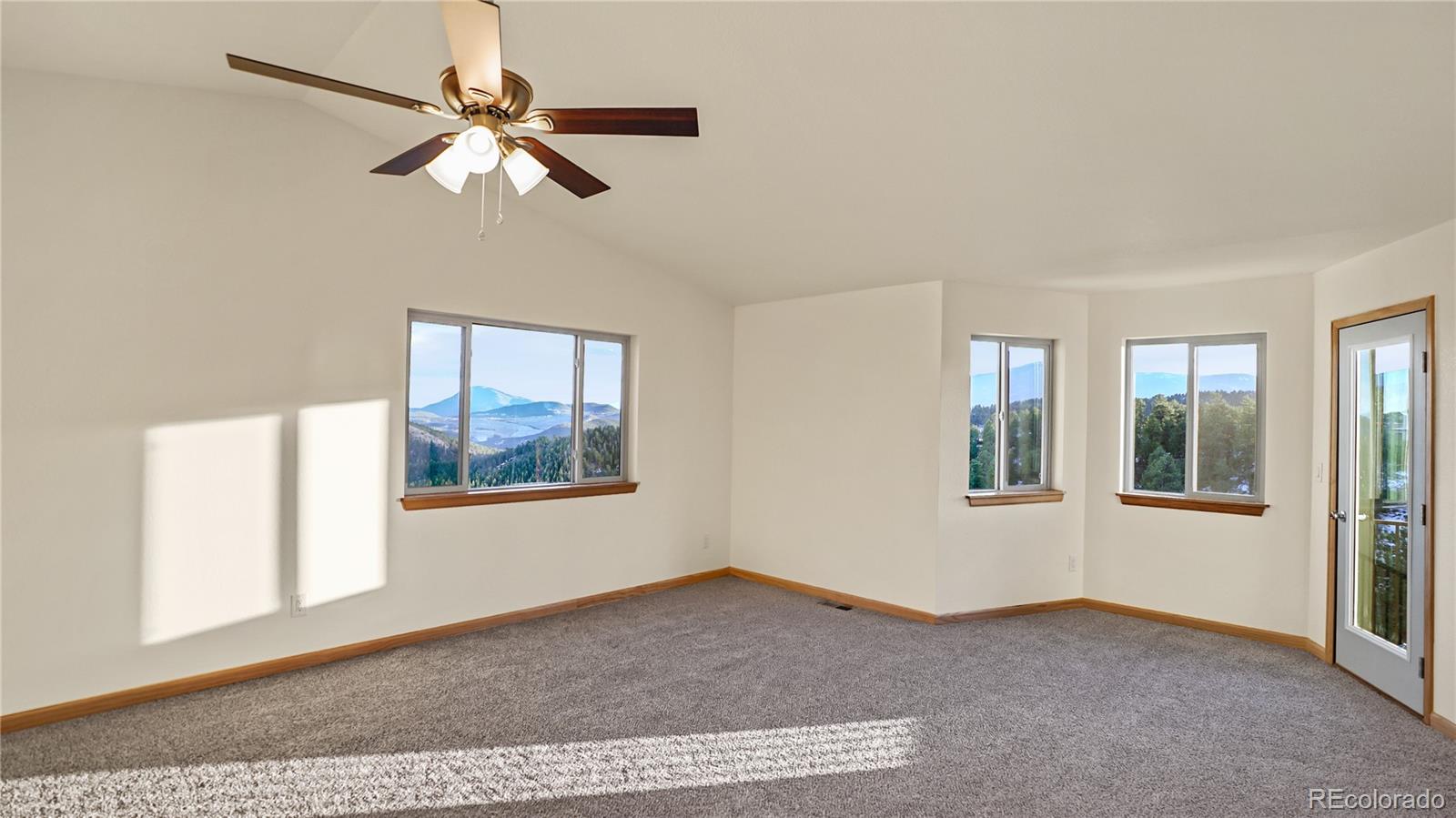 209 Fawn Road Bailey, CO 80421 - Photo 14 of 27 a view of an empty room with a window