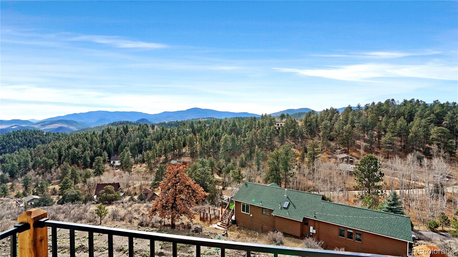 209 Fawn Road Bailey, CO 80421 - Photo 20 of 26 a view of a city from a balcony