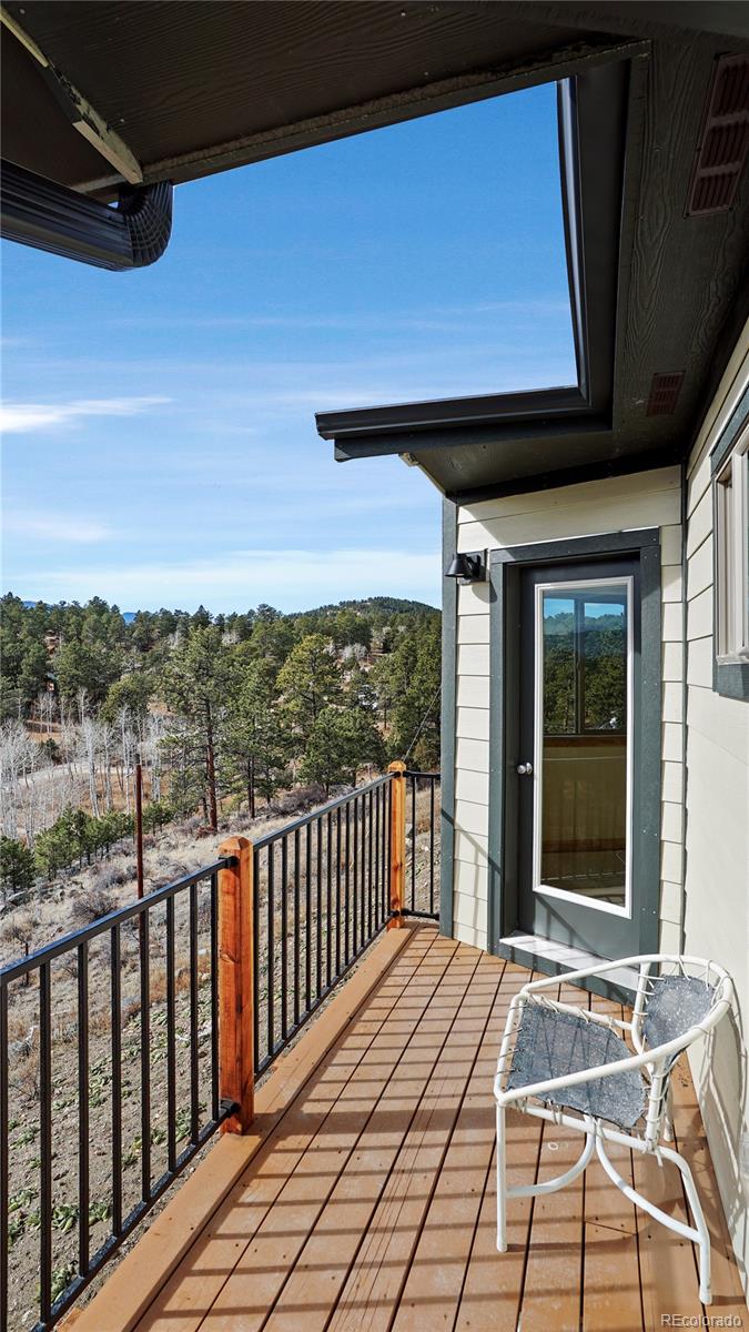 209 Fawn Road Bailey, CO 80421 - Photo 21 of 26 a view of a balcony