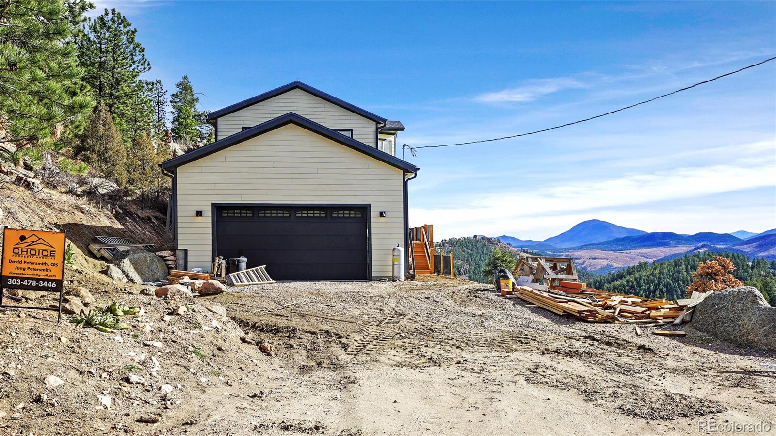 209 Fawn Road Bailey, CO 80421 - Photo 24 of 27 front view of a house with a yard