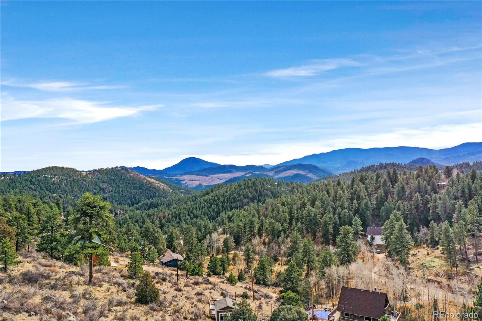209 Fawn Road Bailey, CO 80421 - Photo 27 of 27 a view of a mountain with sunset in the background