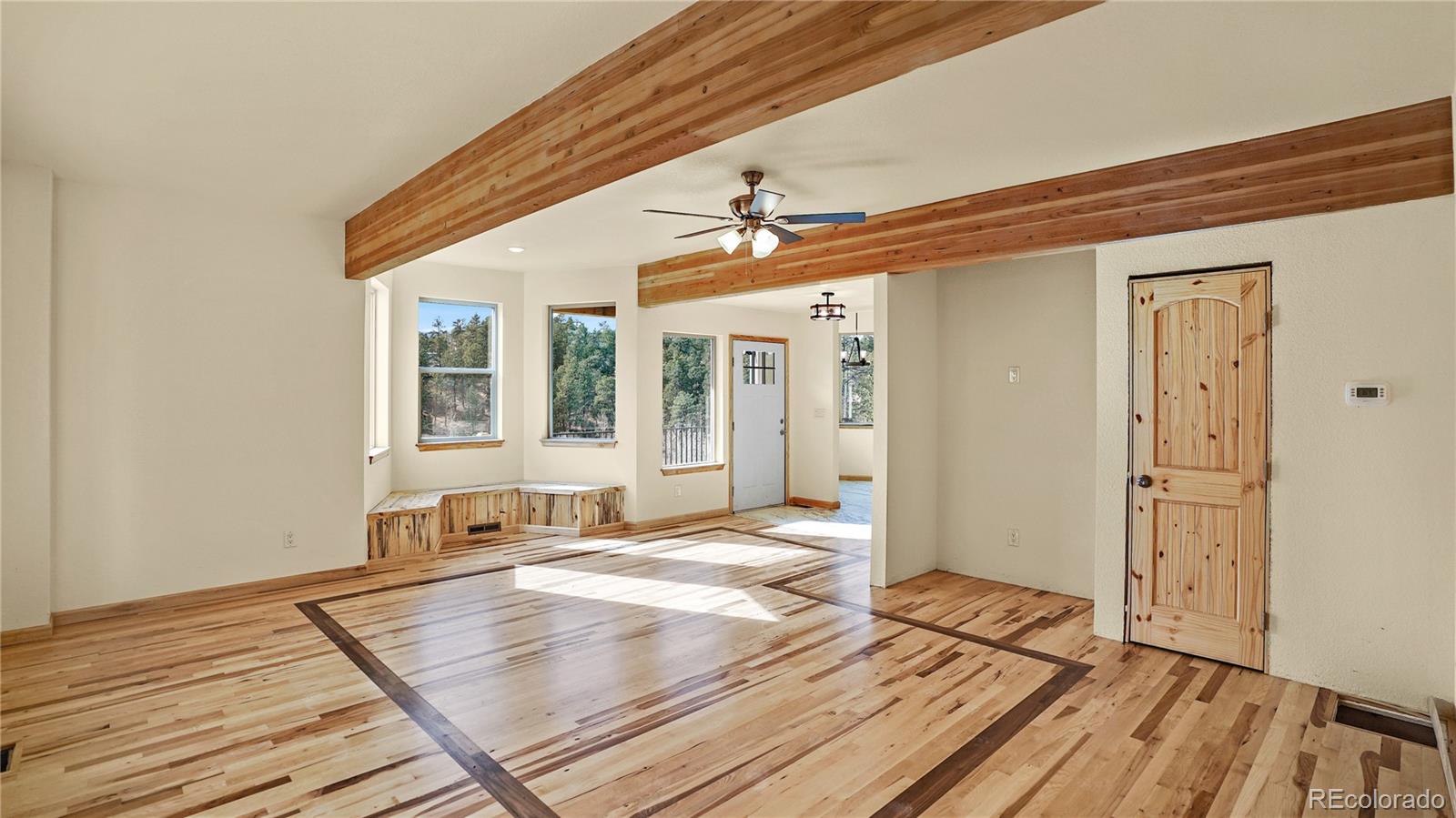 209 Fawn Road Bailey, CO 80421 - Photo 8 of 26 a view of a living room