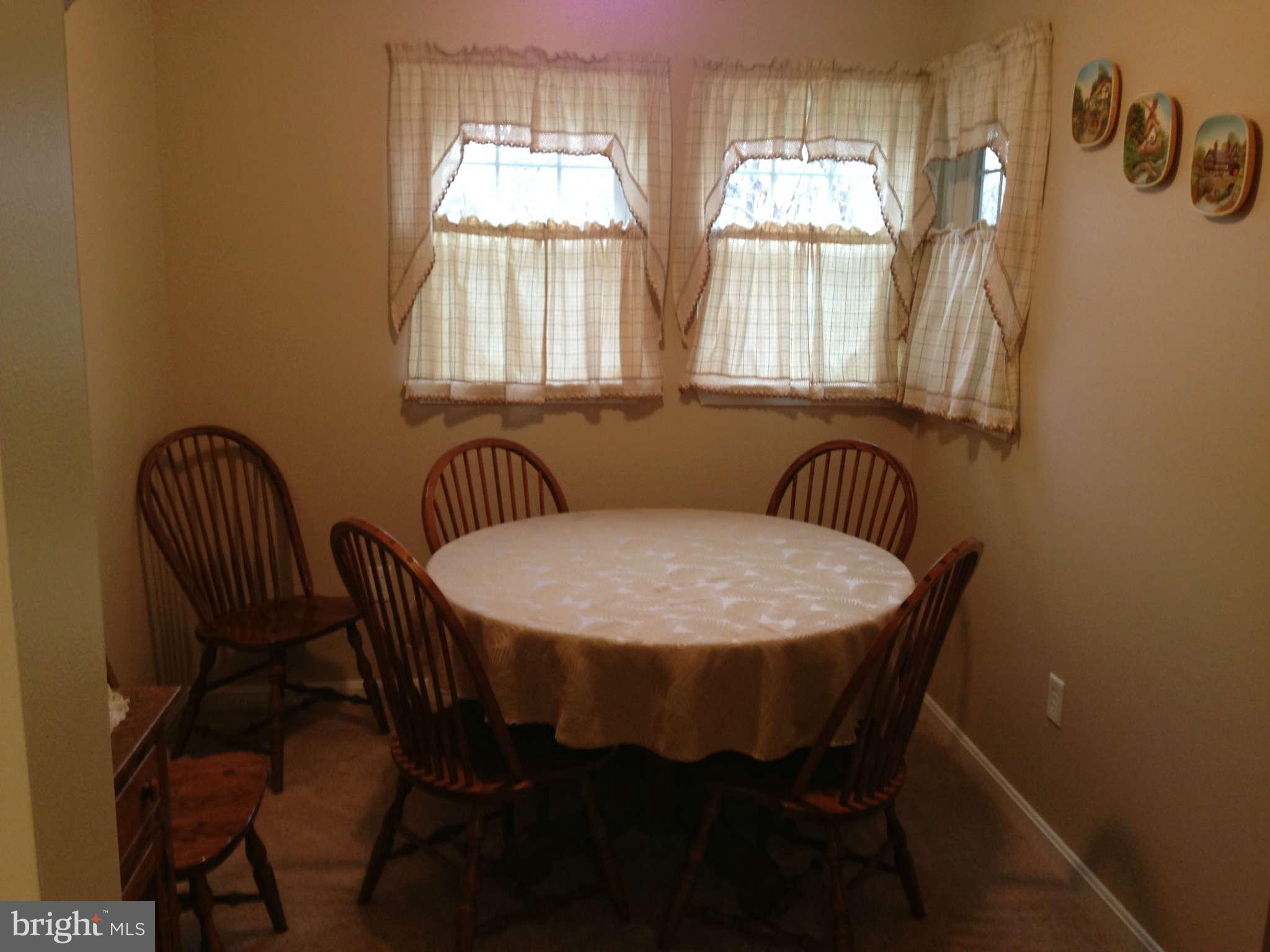 8607 Falls Run Road, Unit B Ellicott City, MD 21043 - Photo 12 of 21 Dining Room