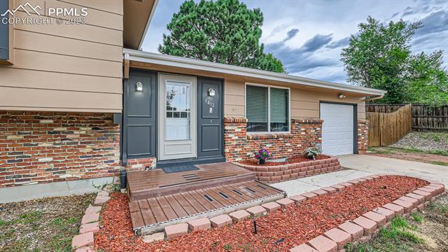 1412 Wooten Road Colorado Springs, CO 80915 - Photo 3 of 32 Front porch