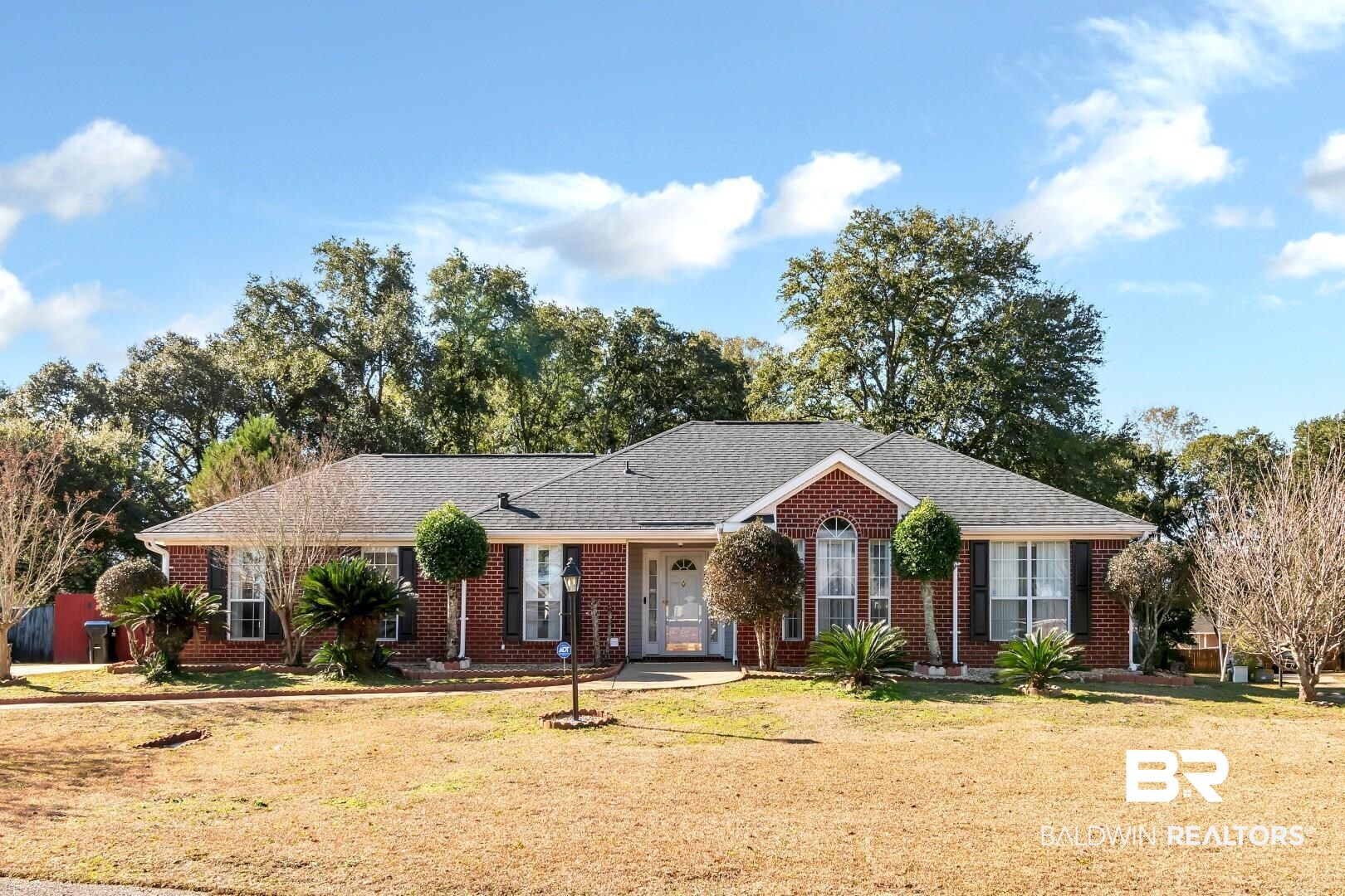 8221 Woodbend Drive Semmes, AL 36575 - Photo 1 of 35 Ranch-style home with a front lawn