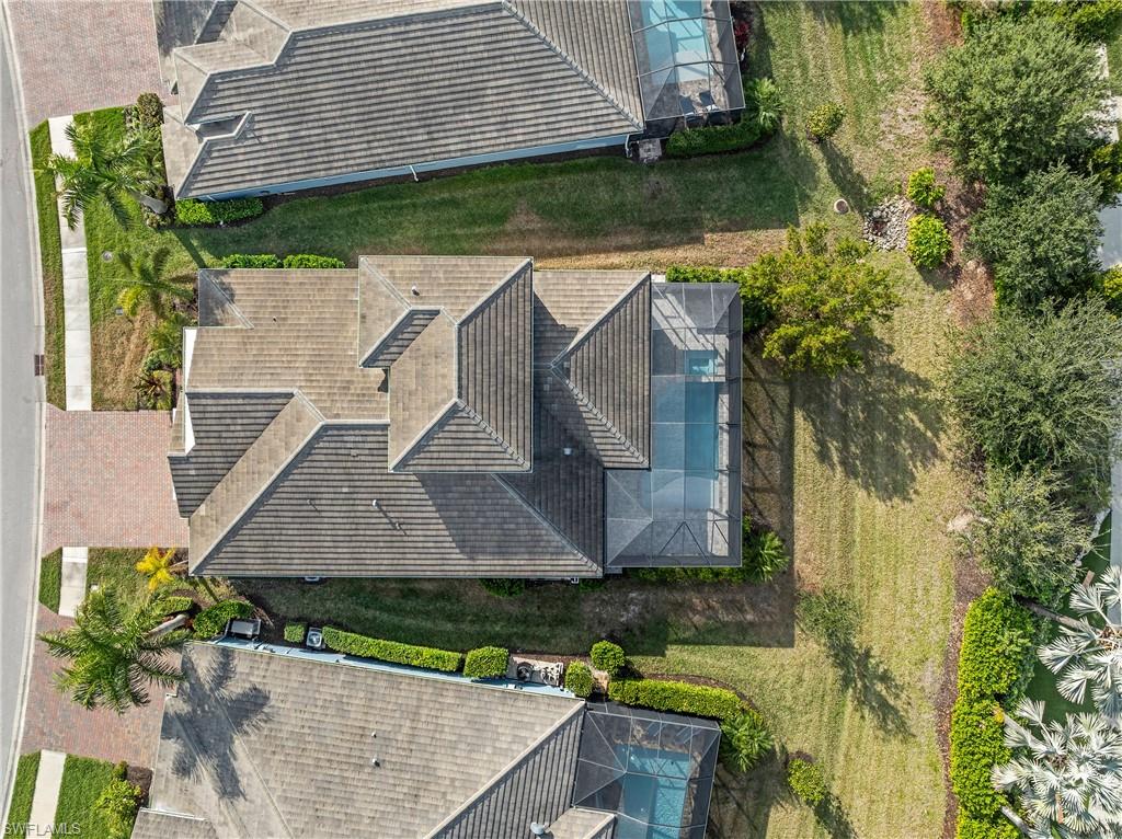 14586 Kelson Circle Naples, FL 34114 - Photo 2 of 35 an aerial view of a house with a yard