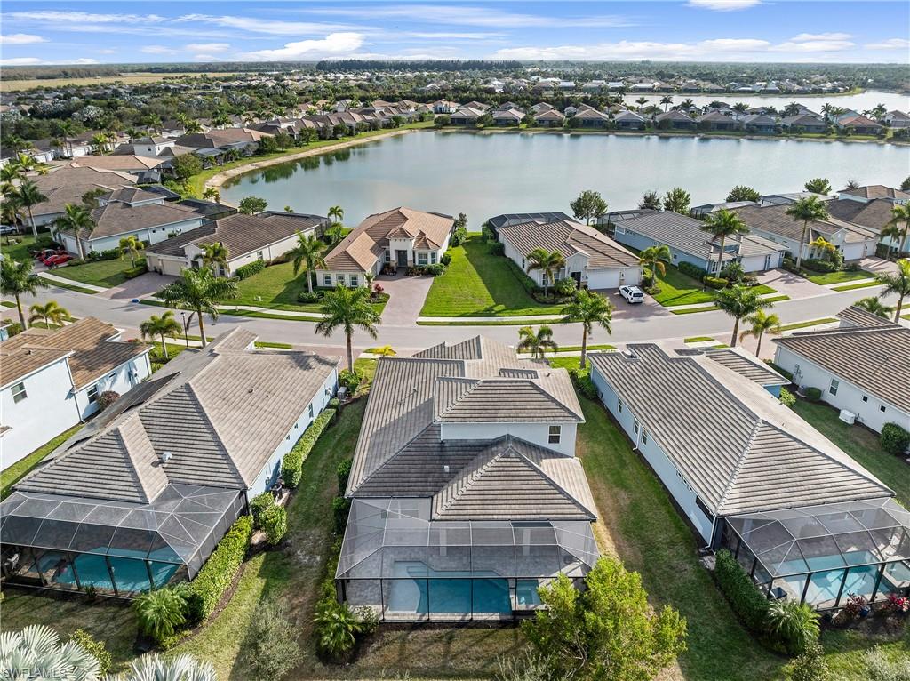 14586 Kelson Circle Naples, FL 34114 - Photo 3 of 35 an aerial view of houses with yard