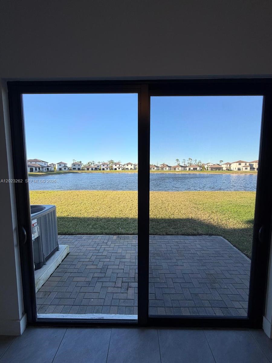 5669 Cerva Lane, Unit 5669 Immokalee, FL 34142 - Photo 7 of 32 a view of outside space with swimming pool