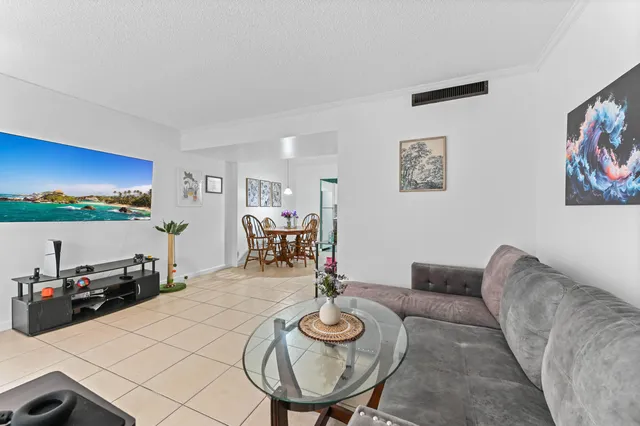 a bed room with furniture and a table