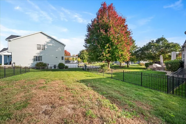 a view of backyard with green space