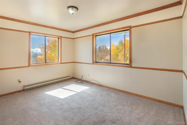 an empty room with windows